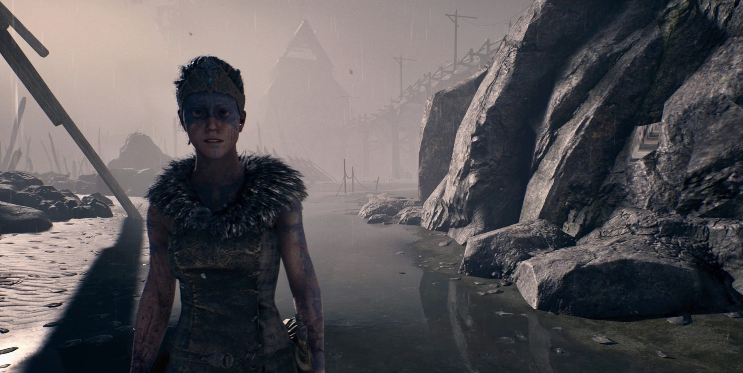 The player-character, Senua, in the game Hellblade (screenshot).